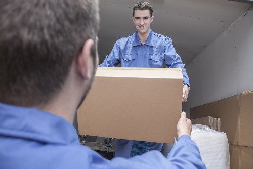 Twickenham Movers team sorting recyclable packing materials during a sustainable home move