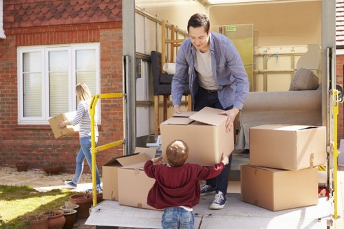 Local team loading furniture into a moving truck in Twickenham