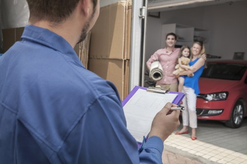 Supervisors reviewing safety procedures before a moving job