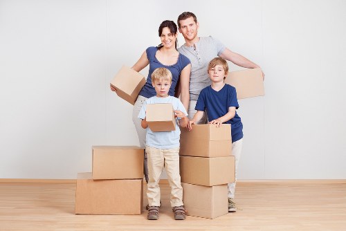 Packed boxes and furniture ready for removals in a Twickenham property