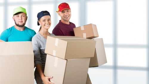 Packed office equipment ready for transport in Twickenham