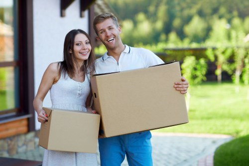 Family home moving day in Twickenham with boxes and furniture