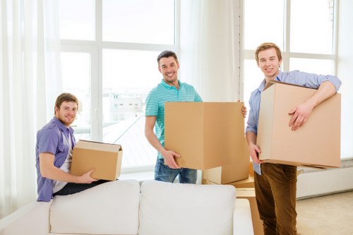 Packing boxes and preparing items for a local move in Twickenham