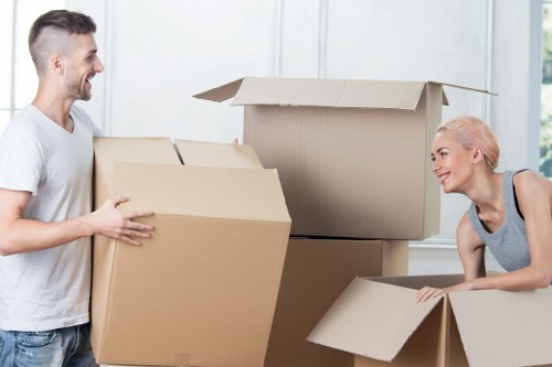 Moving team securing items safely inside a transport vehicle