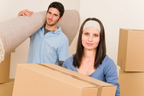 Unloading boxes and furniture into a new home in Twickenham